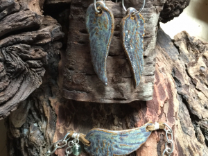Ceramic angel wing bracelet and earring set Ceramic angel wing bracelet and earring set